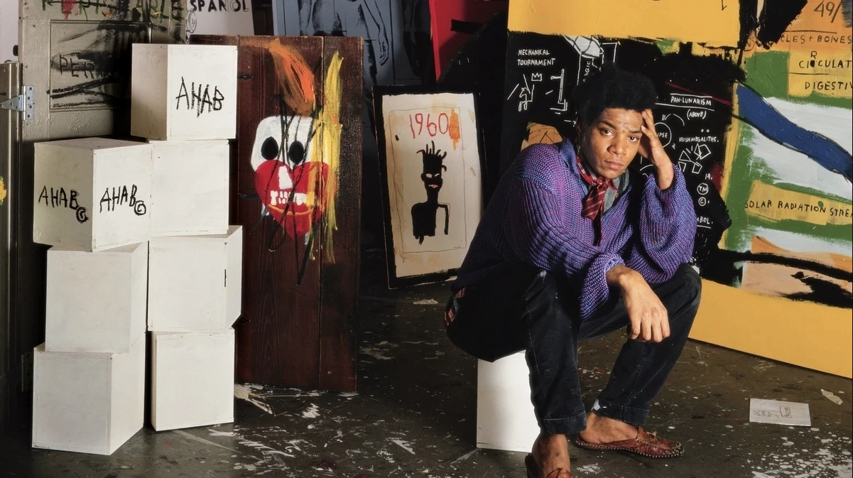 Tseng Kwong Chi. Jean Michel Basquiat in his Great Jones Street studio, New York, 1987. Muna Tseng Dance Projects, New York & Eric Firestone Gallery, East Hampton, New York. © 1987 Muna Tseng Dance Projects, Inc. New York. www.tsengkwongchi.com